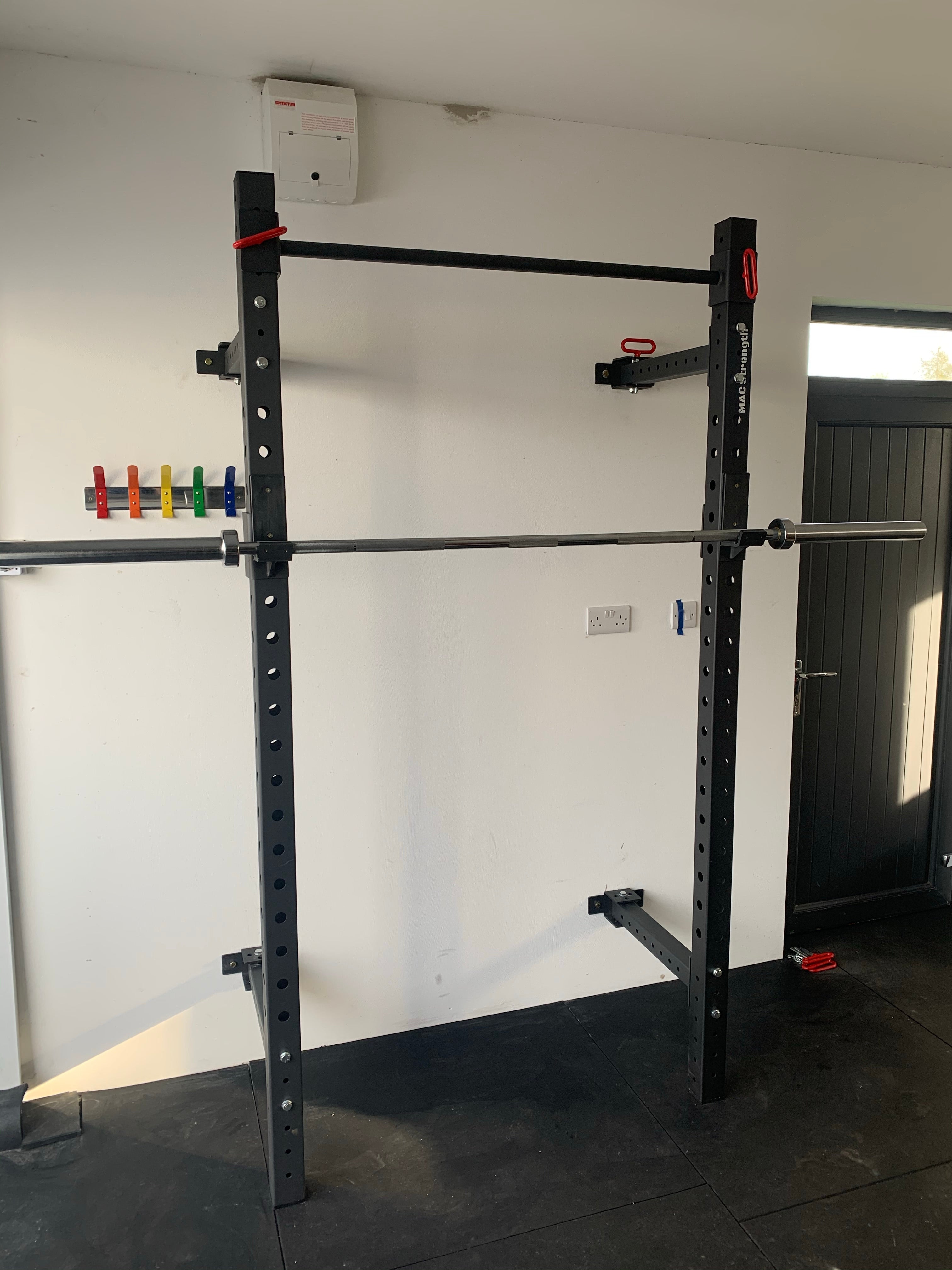 Folding squat rack