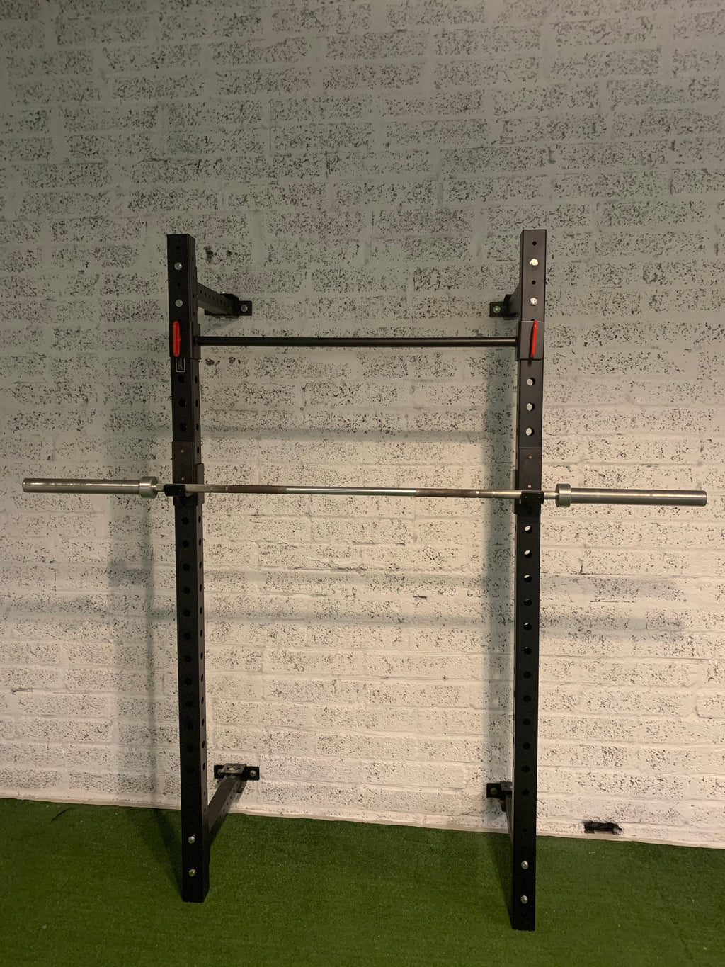 Folding squat rack